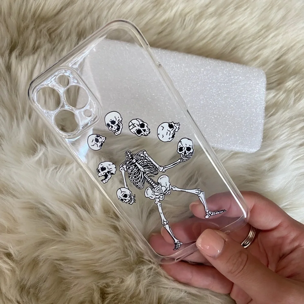 NWT - clear iPhone cases skeleton juggling heads